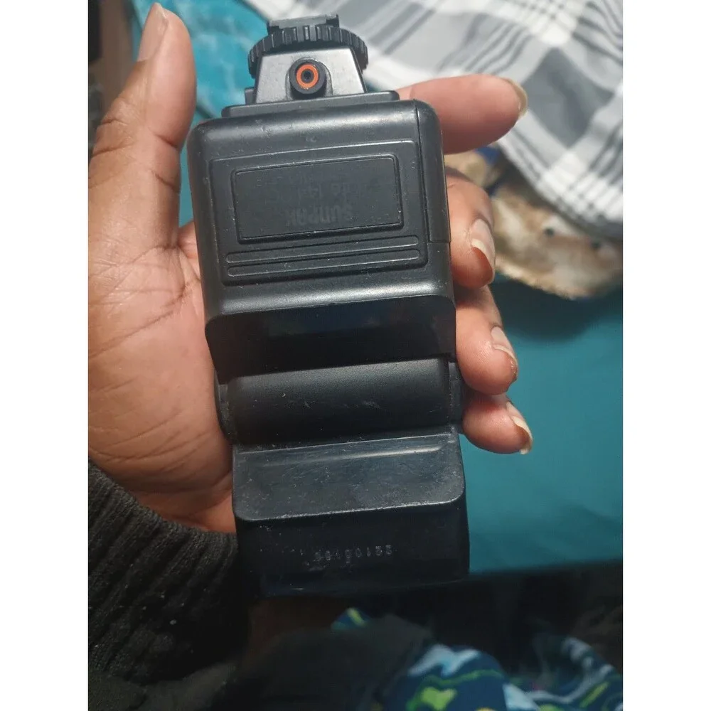 Sunpak auto 144 flash for  film SLR cameras